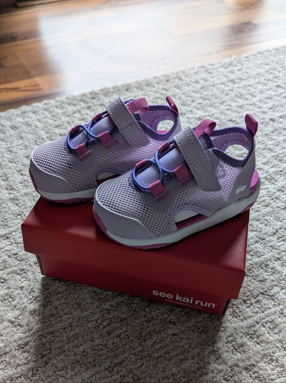 Brand new in box! See Kai Run lavender 'Aven' sandals, size C7